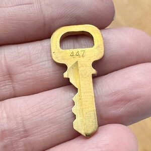 # 447 Authentic Louis Vuitton Gold Key only.